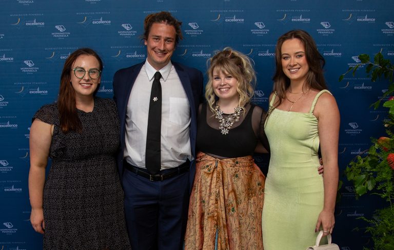 Jason Gardner and Your Move Health team posing for photo at Business Excellence Awards 2023